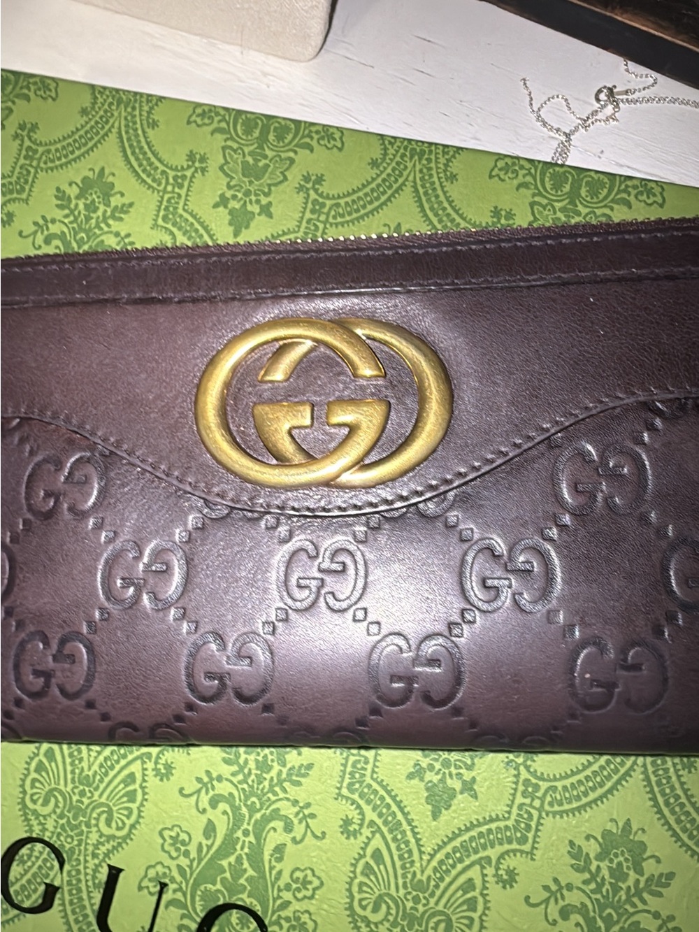 Gucci Guccissima zip-around wallet features signature embossed monogram leather - Picture 7 of 14